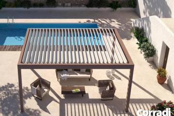 Pergola bioclimatica Maestro Corradi con arredi in corda nautica