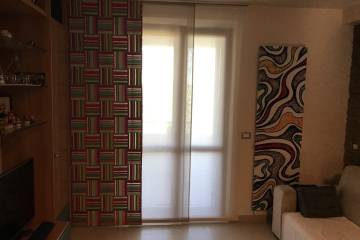 Pannelli scorrevoli con tessuto Manuel Canovas