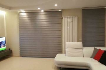 Tende a rullo con tessuto night & day e fascia di copertura